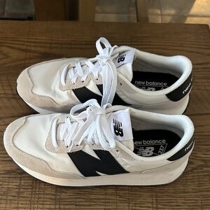New Balance White and Black Athletic Shoes